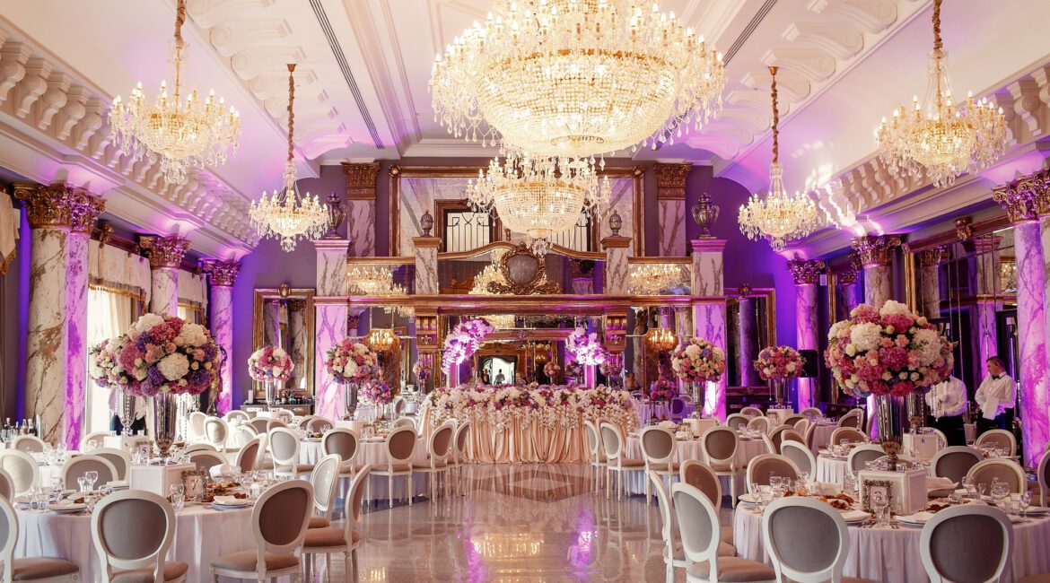 luxurious dinner hall with large crystal chandelier