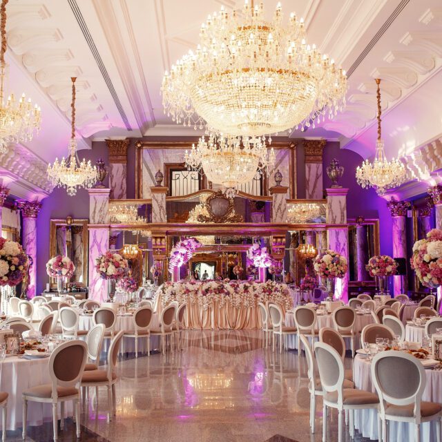 luxurious dinner hall with large crystal chandelier